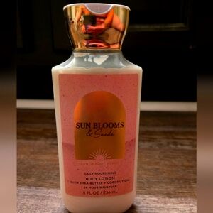 Bath & Body Works Sun Blooms & Suede lotion.